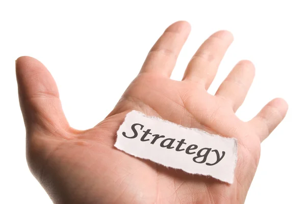 Estratégia palavra na mão — Fotografia de Stock