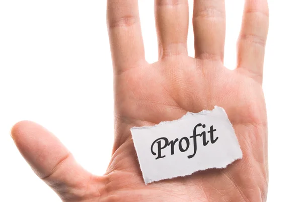 Profit word in hand, word on piece tear paper — Stock Photo, Image