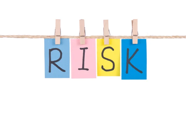 Kockázat, színes szavak hang a kötél — Stock Fotó