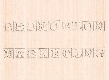 Promotion and marketing word stamped on wooden background clipart