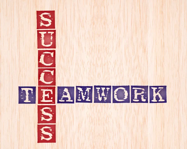 Success and teamwork word stamped on wooden background. words collection se — Stock Photo, Image