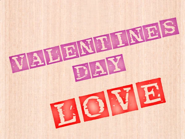 Valentins day and love word stamped on wooden background. — Stock Photo, Image