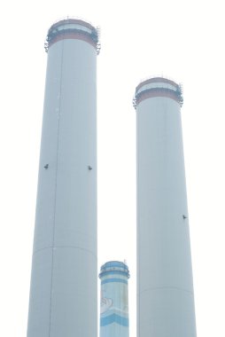 Isolated chimneys of thermal power plant clipart