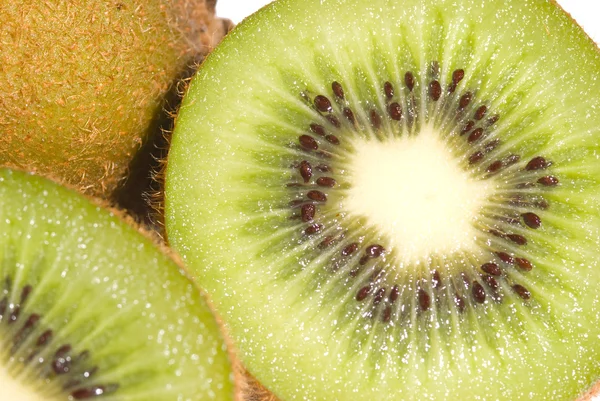 Зеленый киви фрукты и ломтик — стоковое фото