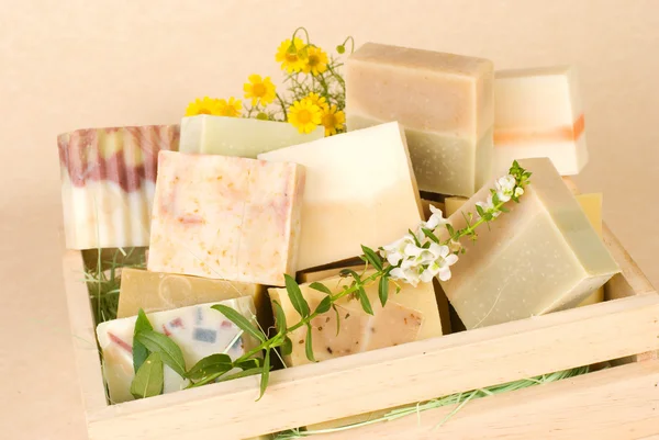 Group of handmade soap in wooden box