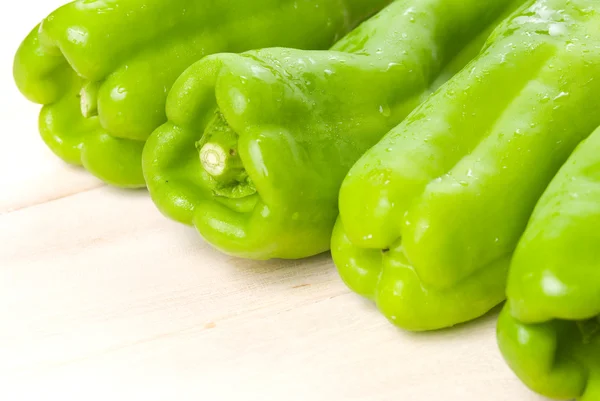 Group Green Bell Peppers Wooden Background — Stock Photo, Image