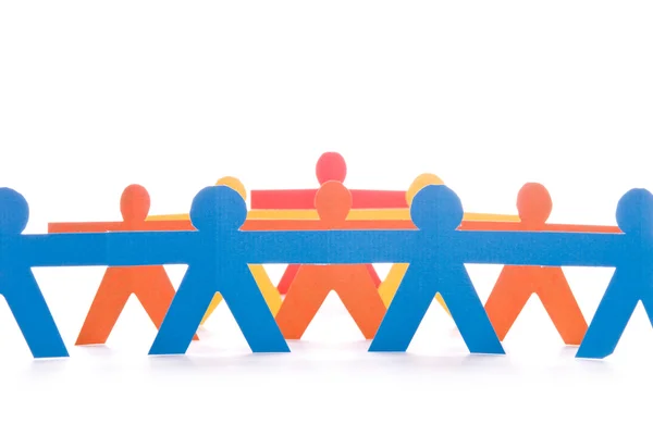 Concept van teamwork, kleurrijke papieren poppetjes — Stockfoto