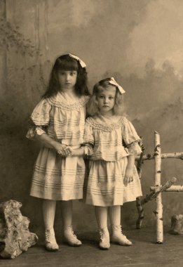 Vintage photo - little sisters. clipart