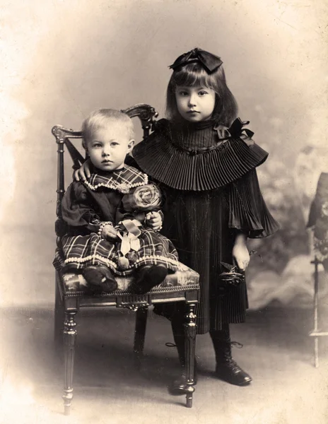 Vintage photo - little Sister and brother. — Stock Photo, Image