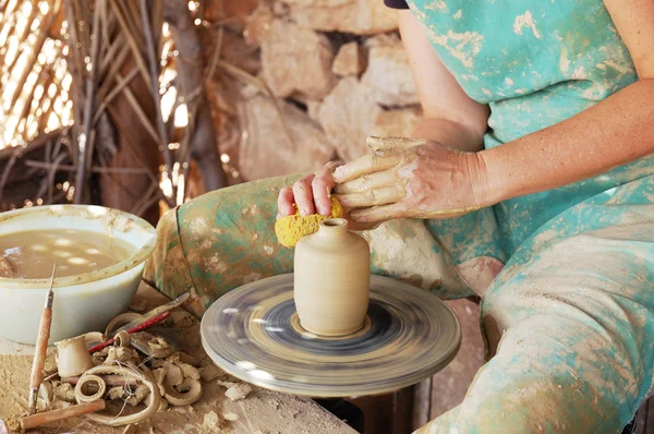 stock image Close up of the hands of a potter creating a jug