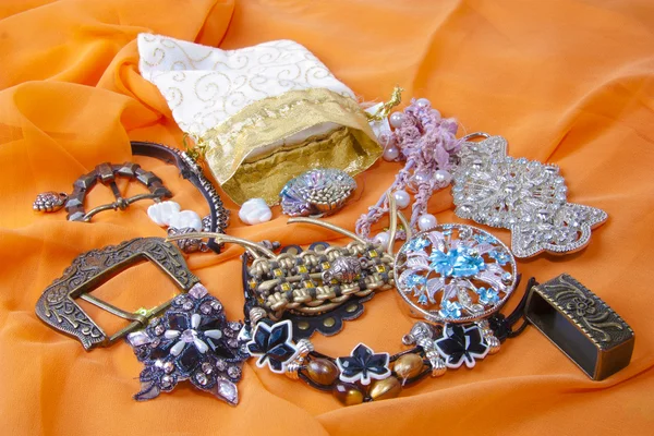 Materials Handmade Beads Rhinestones Buckles Leather Orange Background — Stock Photo, Image