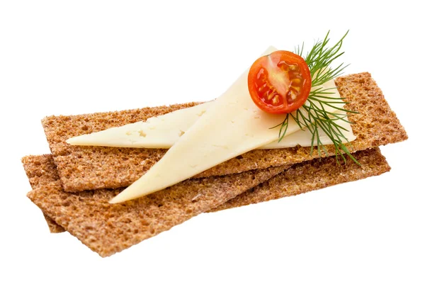 Crispbread with cheese, tomato and dill Royalty Free Stock Photos