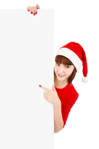 Санта-женщина указывает на пустой рекламный щит — стоковое фото