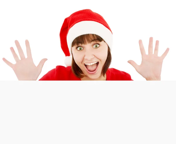 Verrast santa vrouw gluren uit lege billboard — Stockfoto