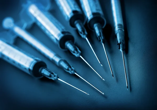 Syringes on black background — Stock Photo, Image