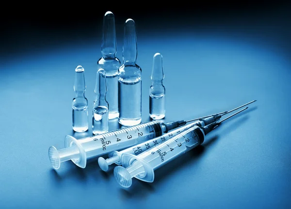 Ampoules and syringes — Stock Photo, Image