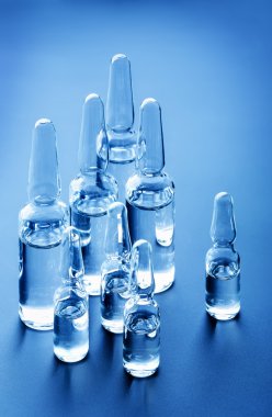 Medical glass ampoules. clipart