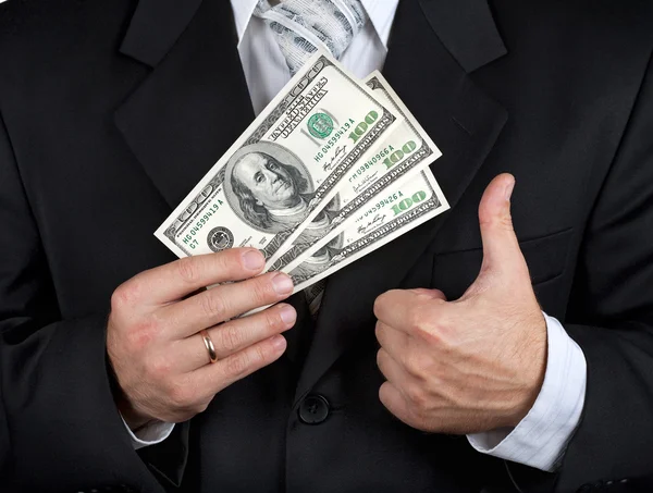 Businessman holding dollar banknotes — Stock Photo, Image