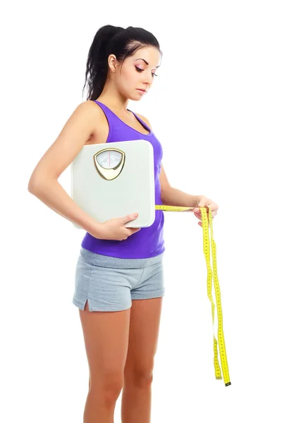 Menina medindo sua cintura — Fotografia de Stock