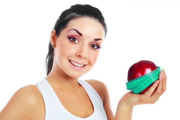 Flicka med ett äpple och tejp — Stockfoto