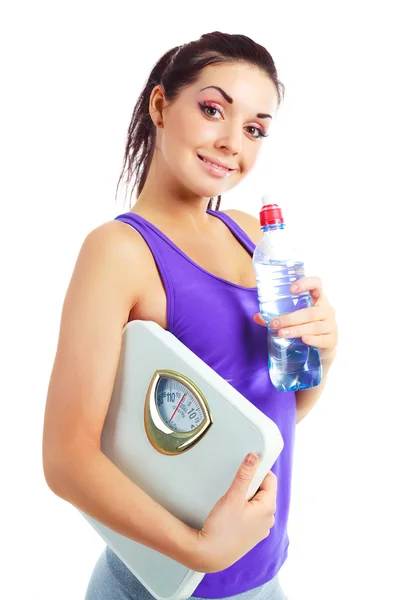 Girl with scales and water — Stock Photo, Image