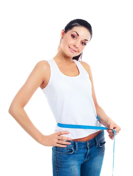 幸せな若い女測定テープと彼女の腰の測定 — ストック写真