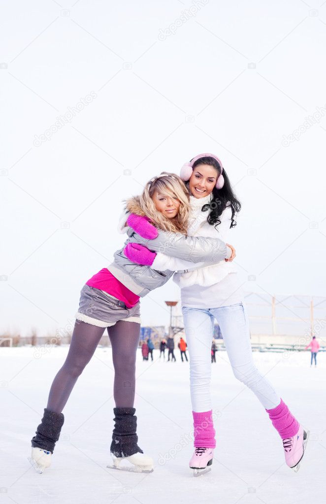 Girls ice skating
