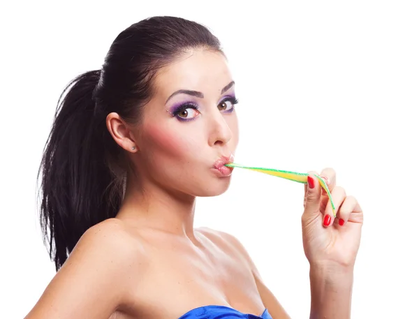 Girl eating a candy — Stock Photo, Image