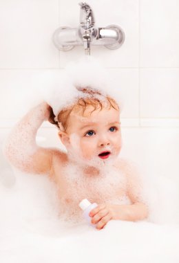 Baby washing hair clipart