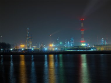 Refinery at night clipart