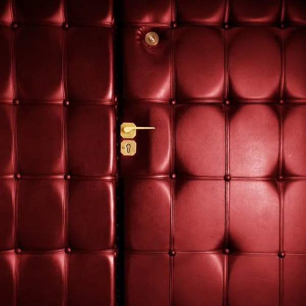 Luxury red leather door in retro style — Stock Photo, Image