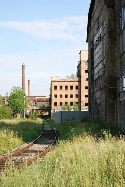 Staré železnice, komíny a mraky — Stock fotografie