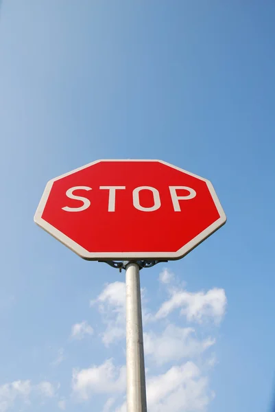 stock image Stop sign against blue sky