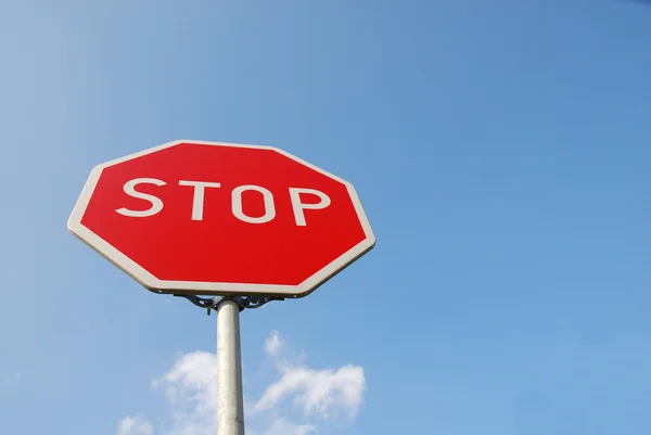 stock image Stop sign against blue sky