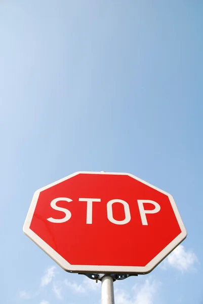 stock image Stop sign against blue sky