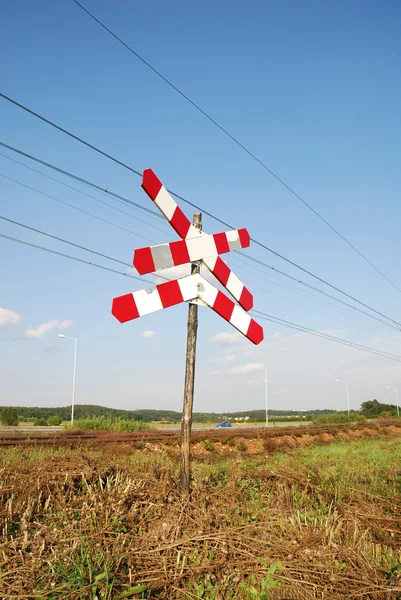 Señal de stop en cruce ferroviario —  Fotos de Stock