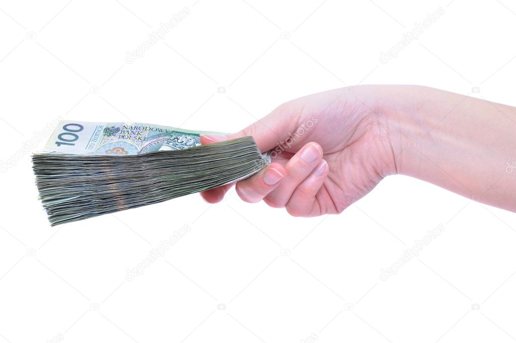 Hand holding many 100 zloty (PLN) banknotes isolated on white background