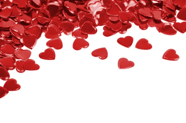 Конфетти с красными сердцами — стоковое фото
