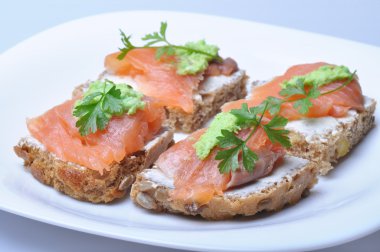 Sandwich with smoked salmon isolated clipart