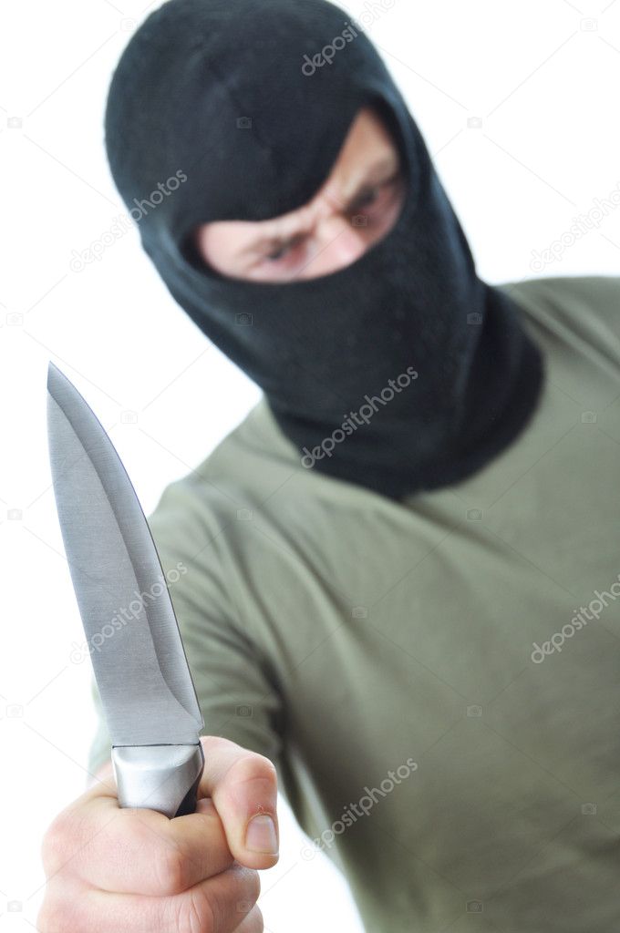 Bandit in balaclava with knife isolated