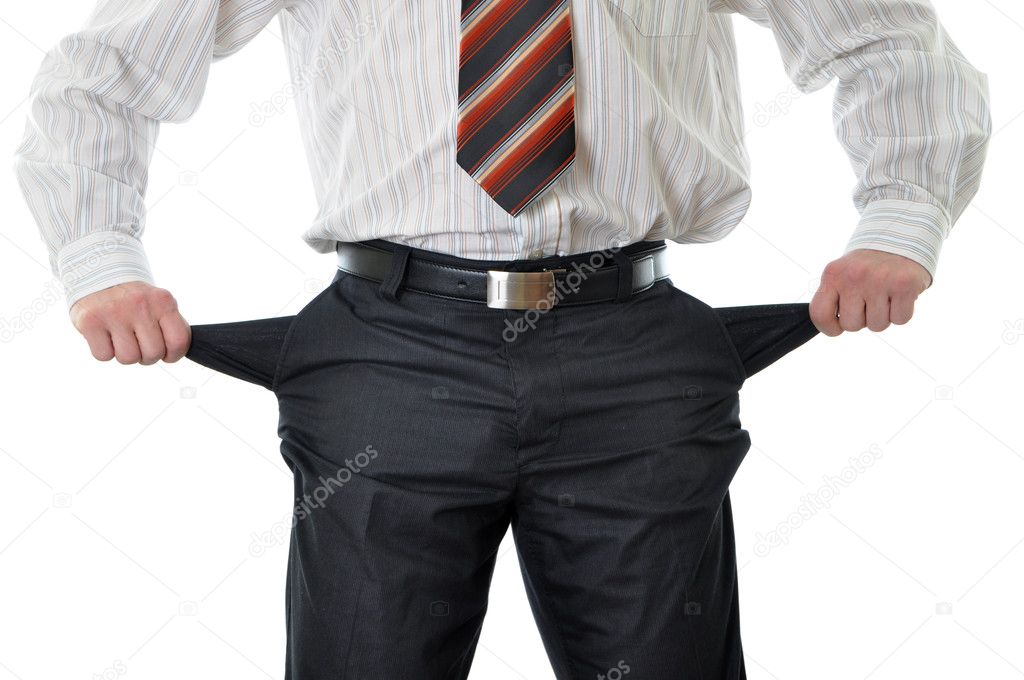 Businessman with empty pockets isolated on white