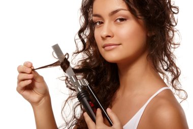 Beauty portrait with curling iron clipart