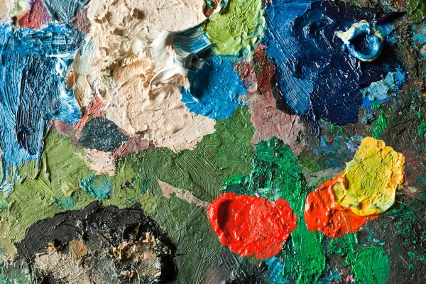 Close-up van kunstenaars palet met gemengde olieverf — Stockfoto