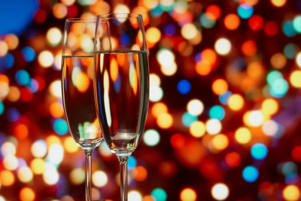 Glasögon med champagne på en abstrakt bakgrund — Stockfoto