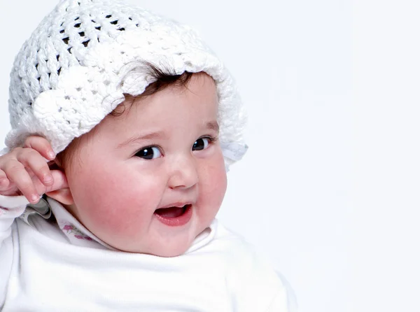 Kleines Mädchen auf weißem Hintergrund. Porträt — Stockfoto