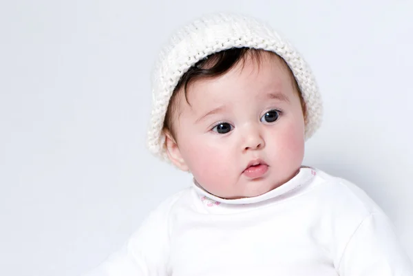 Menina um no fundo branco. Retrato — Fotografia de Stock