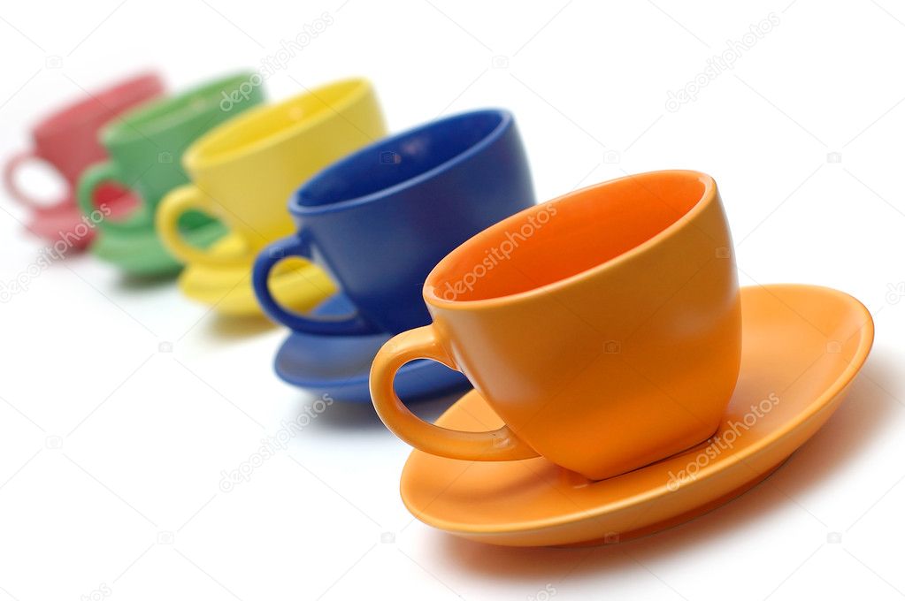 Colored coffee cups and dishes