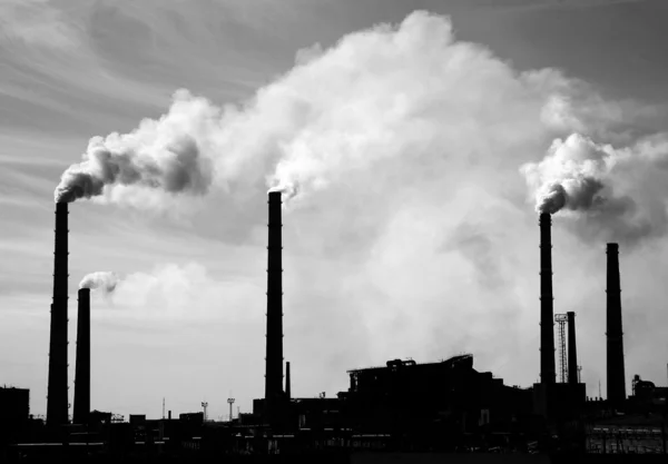 stock image Factory with smoking pipes