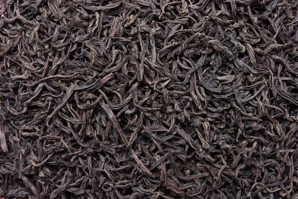 Schwarzer Tee, getrocknete Teeblätter — Stockfoto
