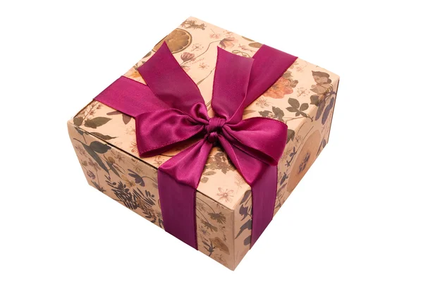 Caixa de presente colorida com fita vermelha — Fotografia de Stock